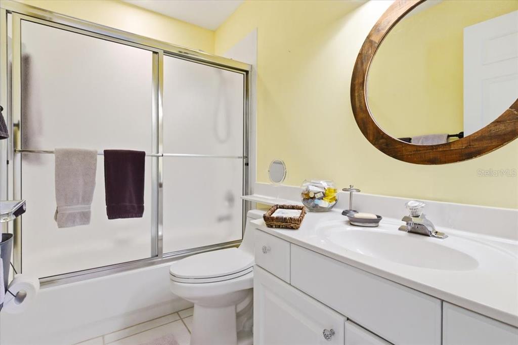 6640 Pineview Terrace, Unit 6640 Bradenton, FL 34203 - Photo 37 of 80 a bathroom with a sink and a mirror