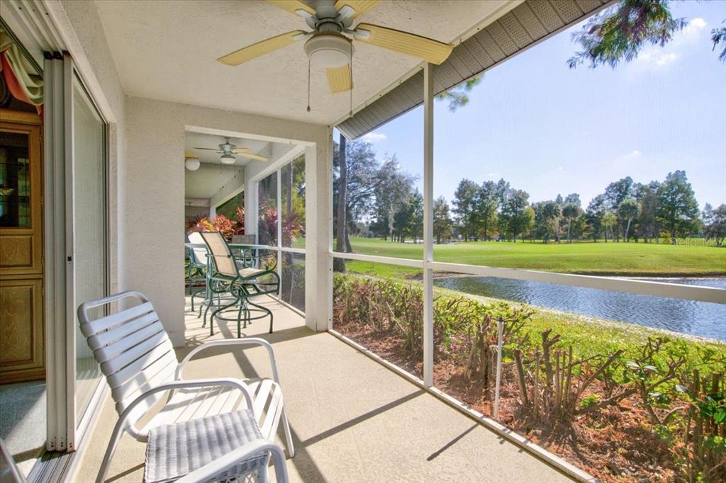 6640 Pineview Terrace, Unit 6640 Bradenton, FL 34203 - Photo 43 of 80 a view of a swimming pool with a patio and a yard