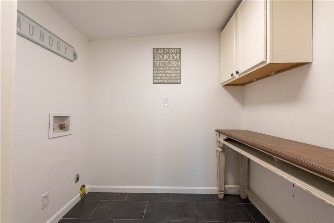 132 Zenna Drive Mathis, TX 78368 - Photo 17 of 40 a view of storage and utility room with washer and dryer