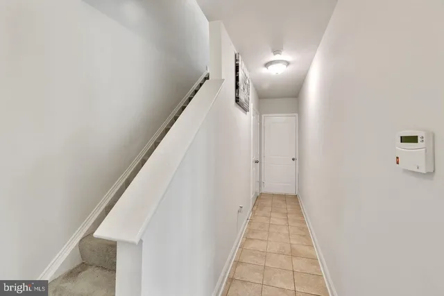 a view of a hallway with windows