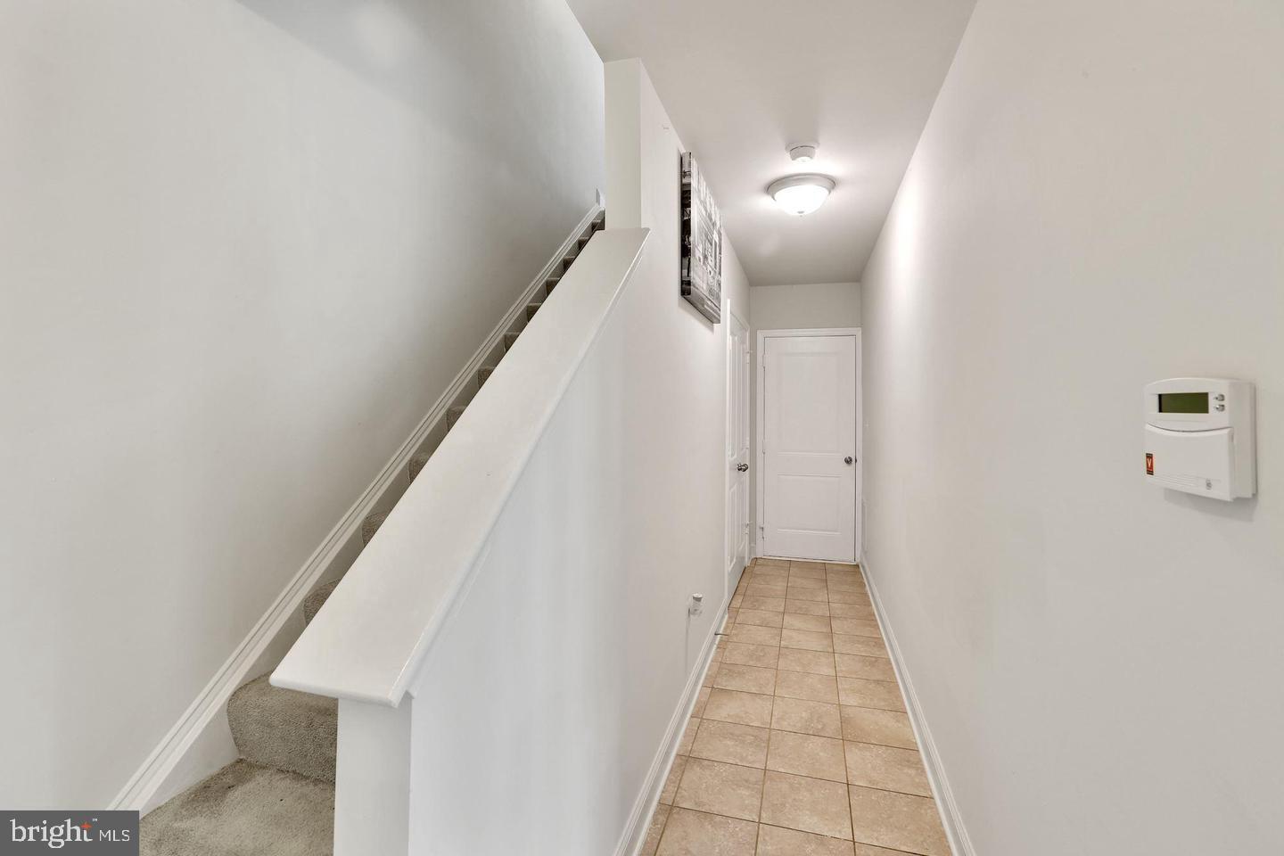 4600 Potomac Highlands Circle Triangle, VA 22172 - Photo 15 of 30 a view of a hallway with windows