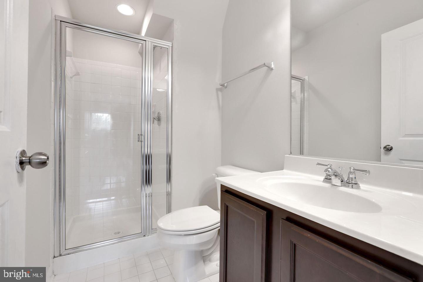 4600 Potomac Highlands Circle Triangle, VA 22172 - Photo 24 of 30 a bathroom with a sink a toilet and shower