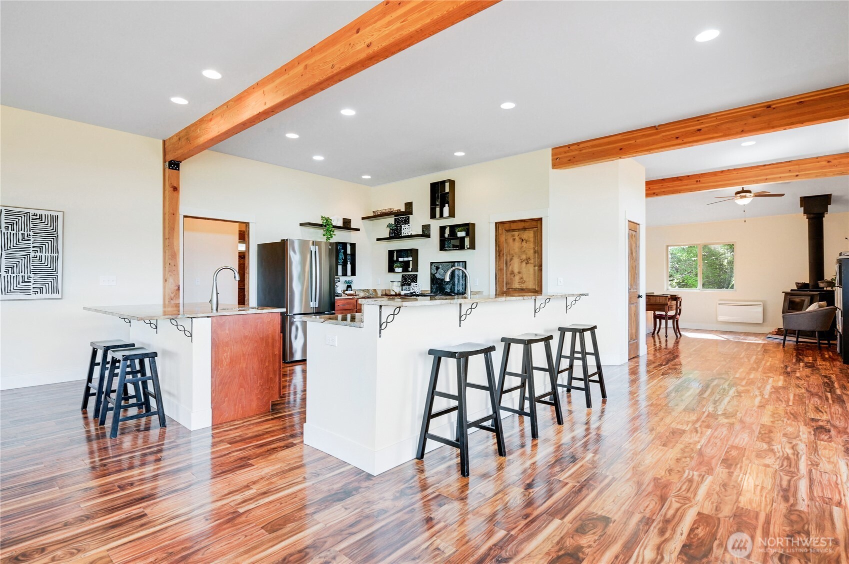 83 Octopus Court Quilcene, WA 98376 - Photo 11 of 40 a dining room with furniture and wooden floor