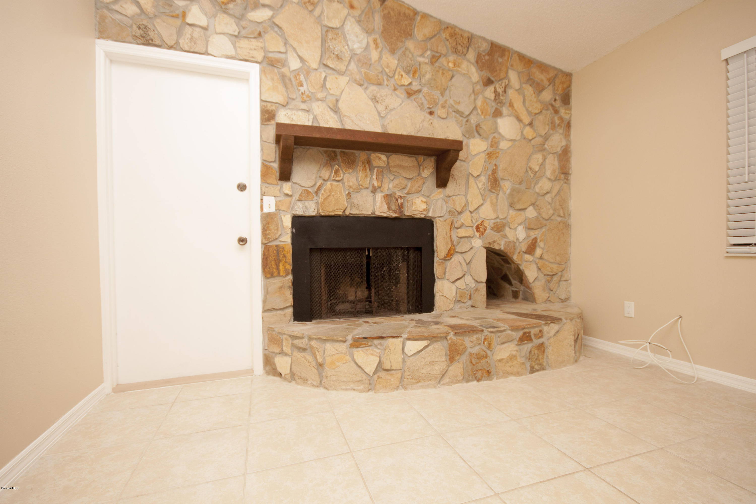 7060 Bryant Road Cocoa, FL 32927 - Photo 3 of 15 Fireplace