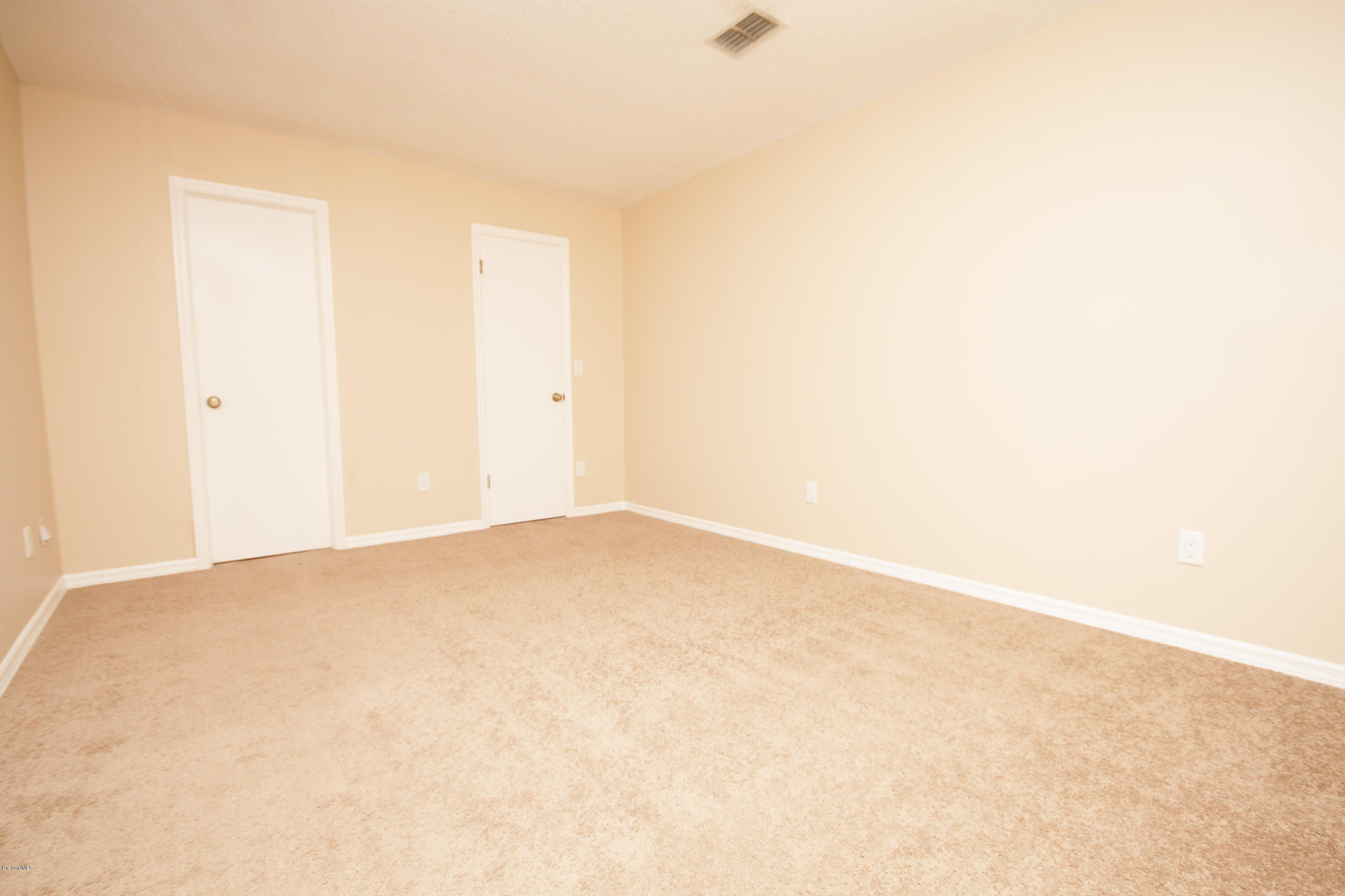 7060 Bryant Road Cocoa, FL 32927 - Photo 7 of 15 Master Bedroom
