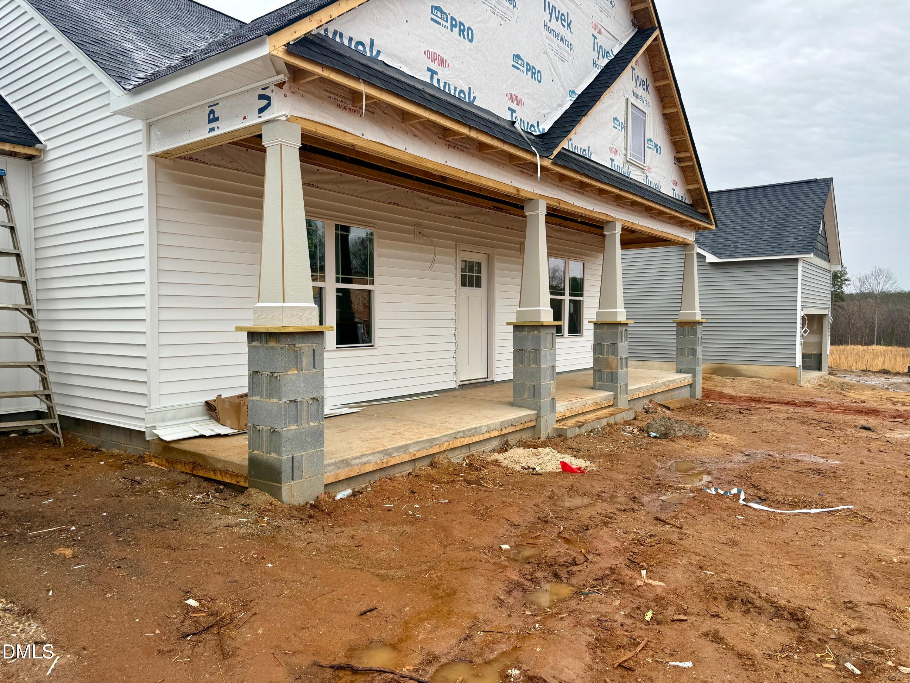 243 Seahawk Way Zebulon, NC 27597 - Photo 5 of 5 a front view of a house with a yard