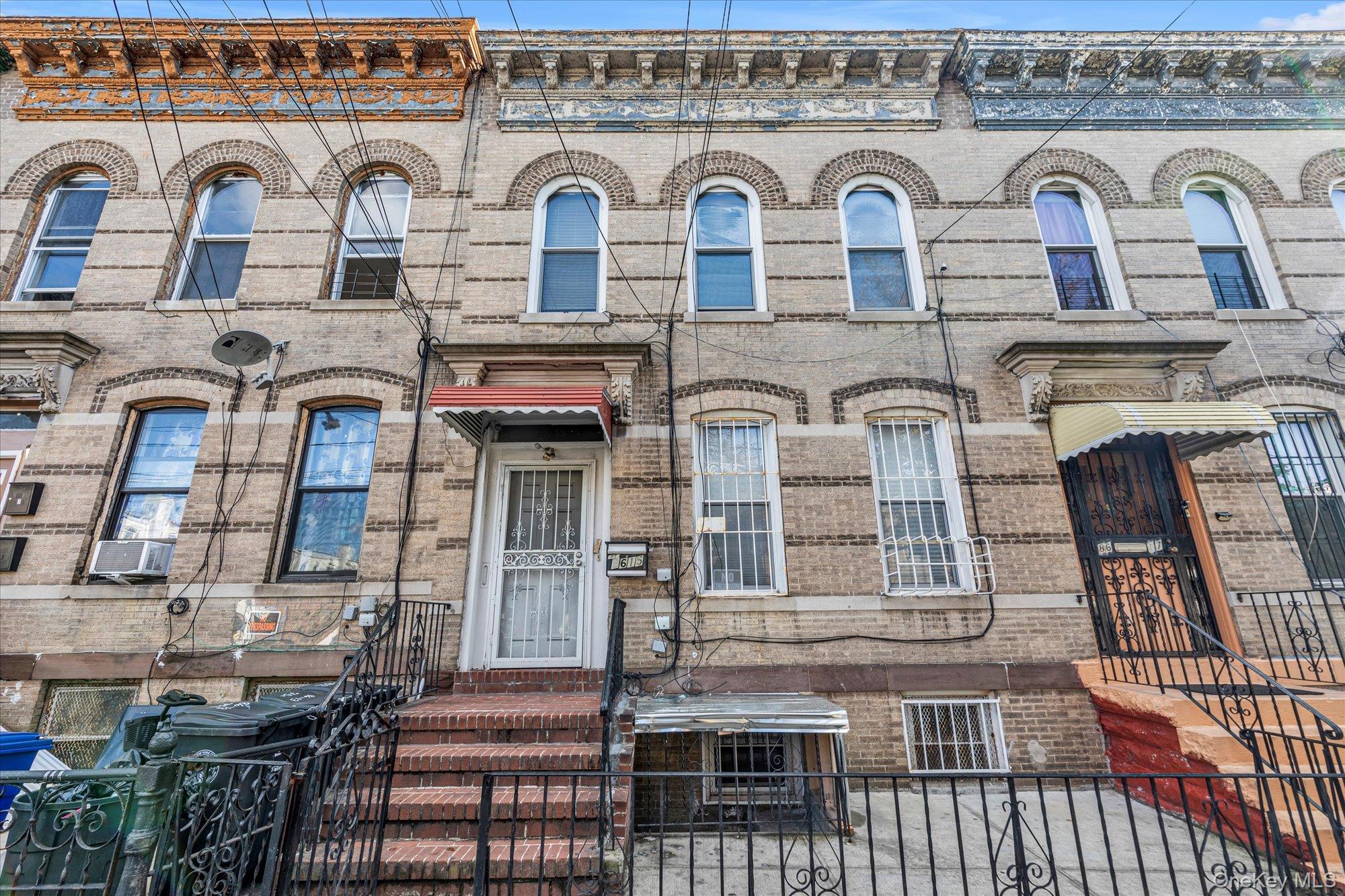 86-15 75th Street Queens, NY 11421 - Photo 1 of 1 a view of a brick building with many windows