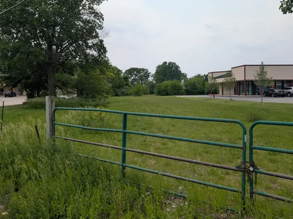 a view of lake with green space