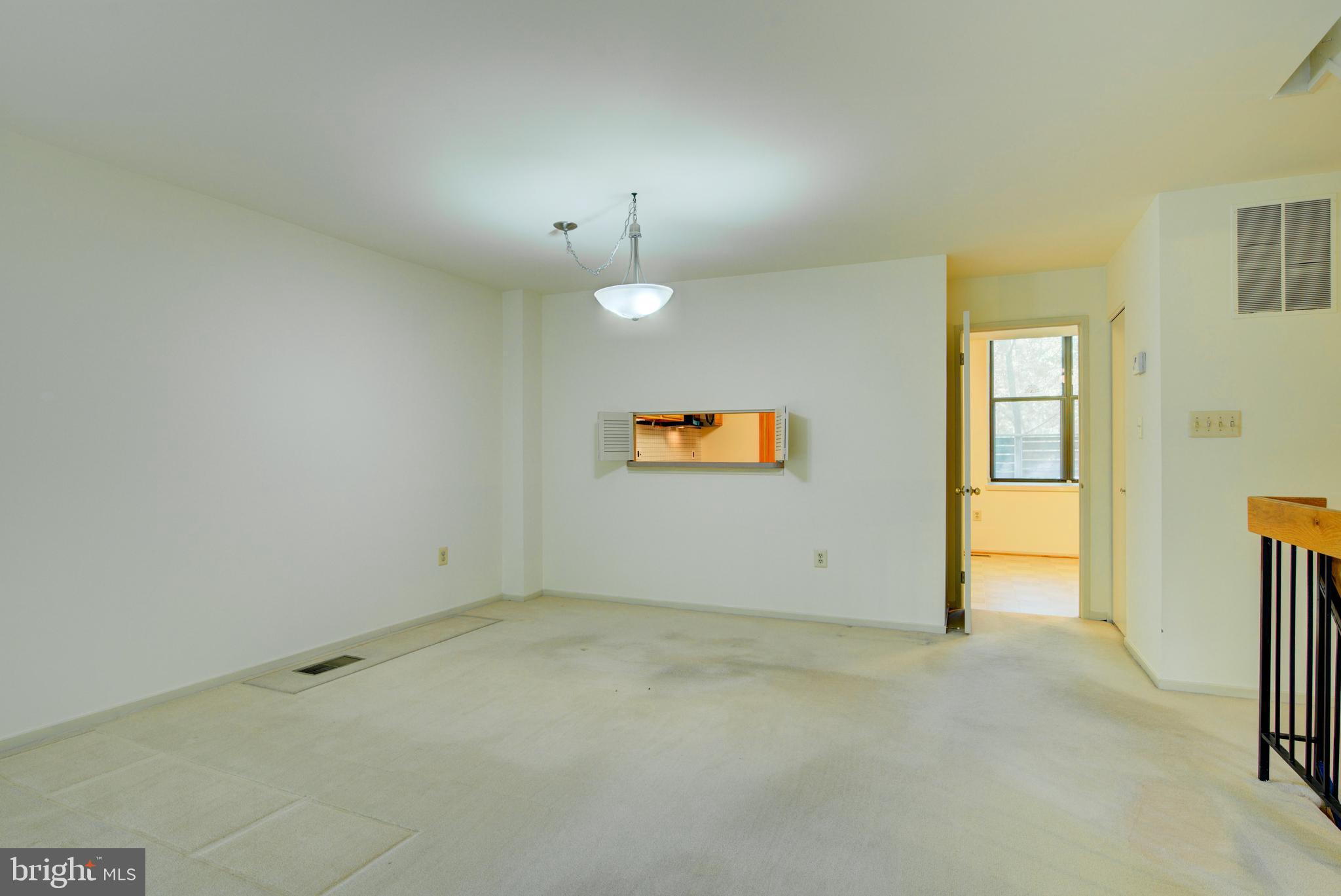 11500 Sunder Court Reston, VA 20190 - Photo 9 of 40 pass through window from kitchen