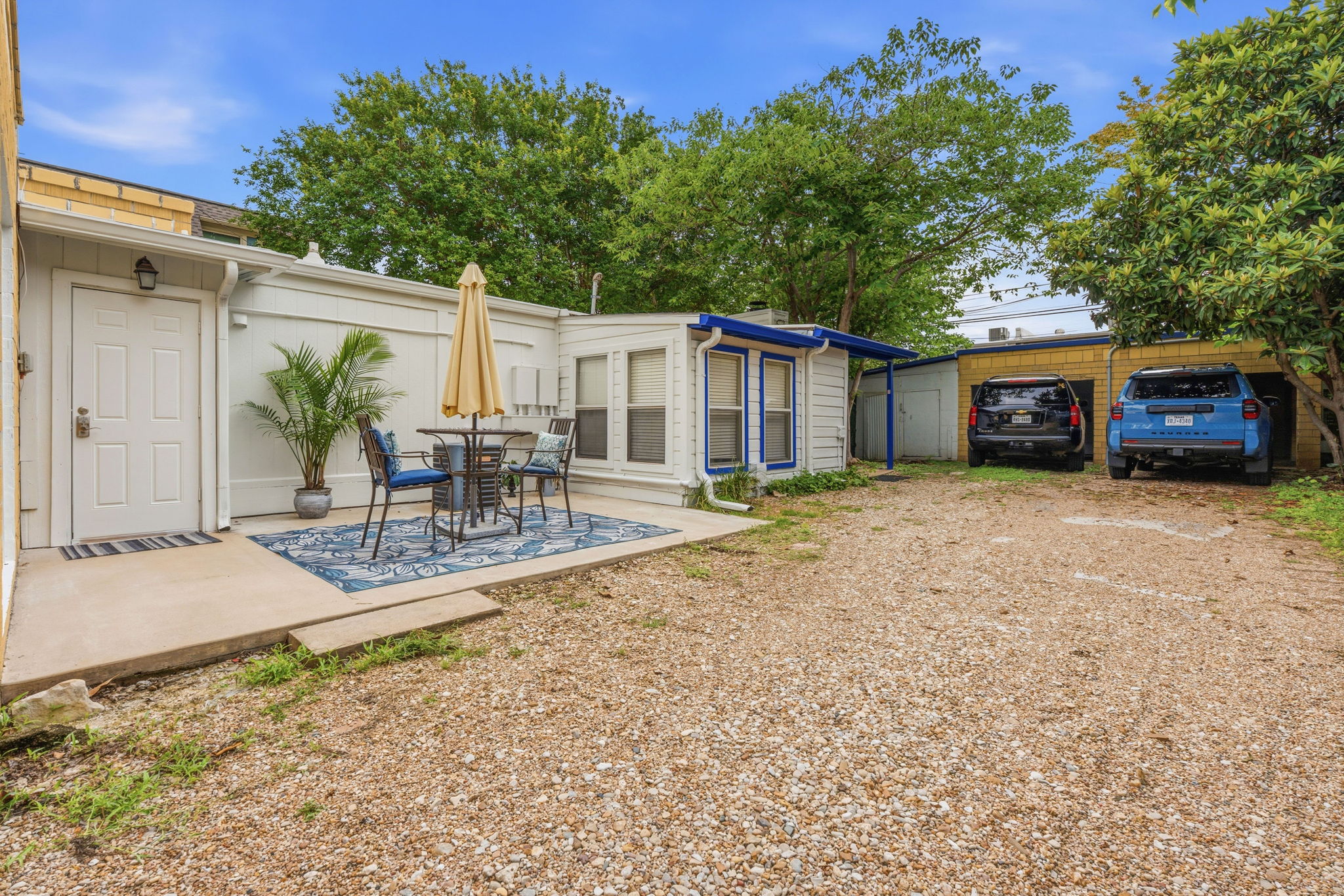 4611 Rosedale Avenue Austin, TX 78756 - Photo 21 of 35 Two open garages add covered parking capacity that most properties in this pocket of Austin simply can't offer, making this an even more compelling value.