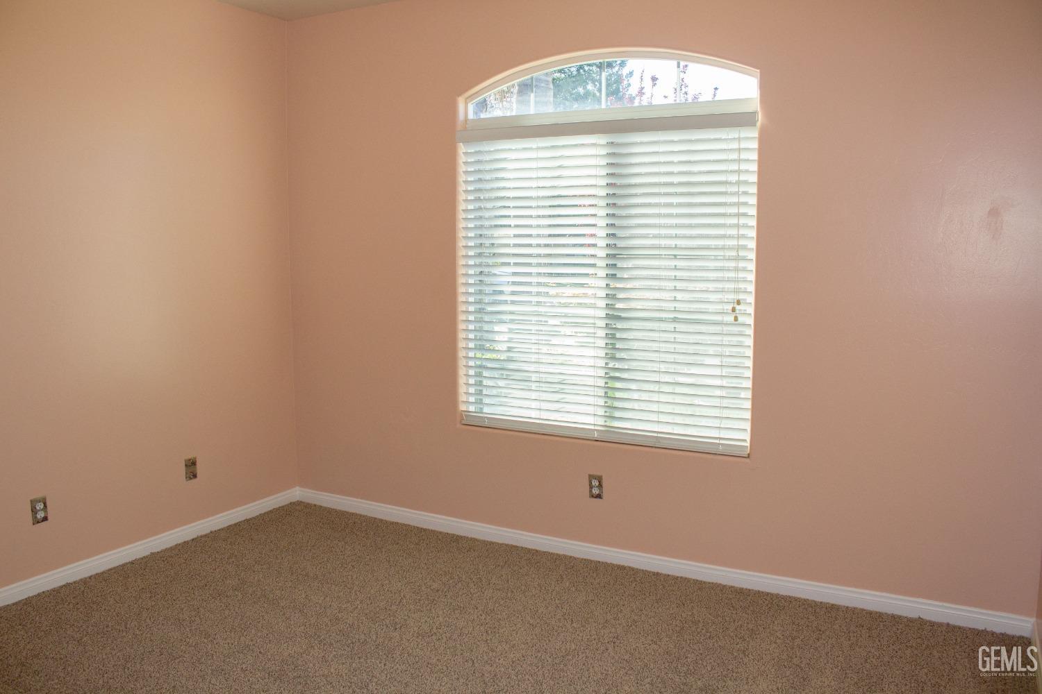 Undisclosed Address Bakersfield, CA 93312 - Photo 19 of 44 an empty room with a window