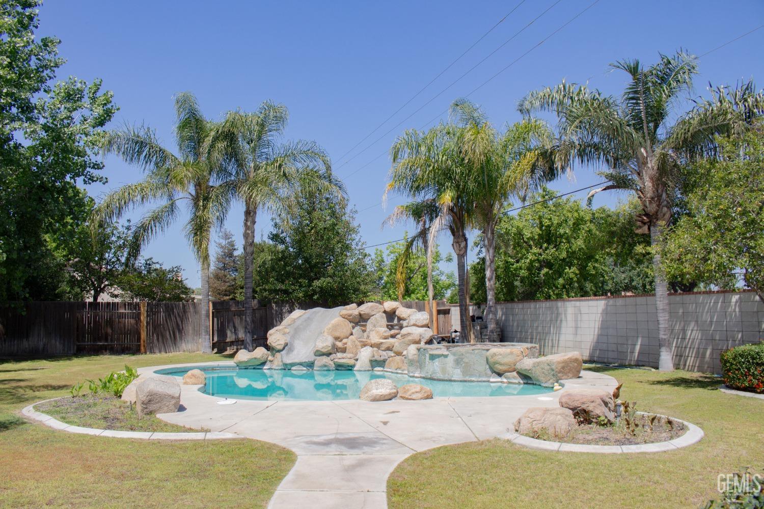 Undisclosed Address Bakersfield, CA 93312 - Photo 33 of 44 a view of a house with backyard and sitting area