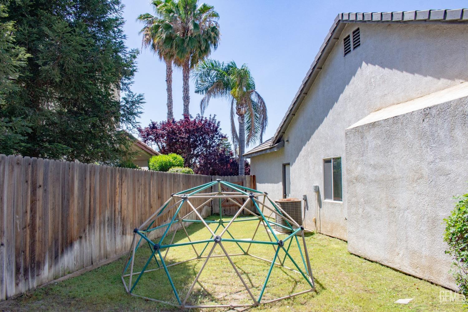 Undisclosed Address Bakersfield, CA 93312 - Photo 35 of 44 a view of backyard with swimming pool and outdoor seating