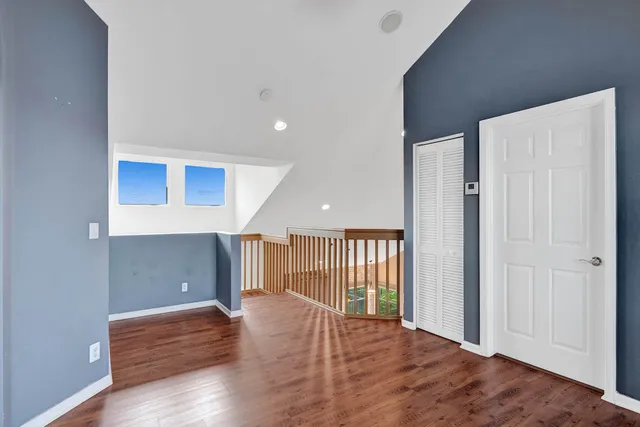 a view of living room with furniture and a fireplace
