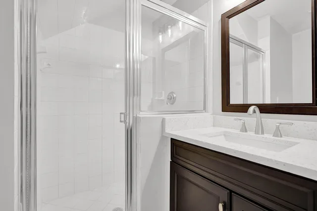 a view of room with window and wooden floor