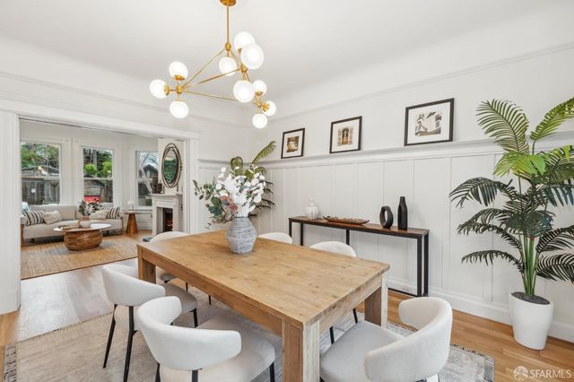 a kitchen with a sink a counter top space and stainless steel appliances