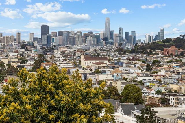 a bedroom with furniture and a table