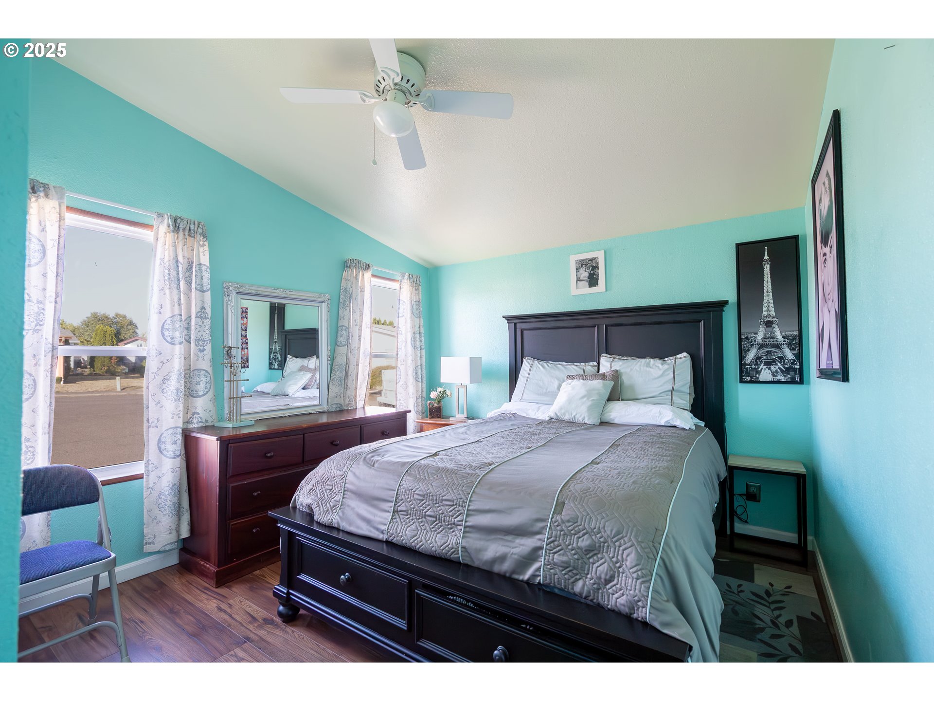 11105 Main Street Northeast, Unit 6 Donald, OR 97020 - Photo 13 of 23 a bedroom with a bed table and chair
