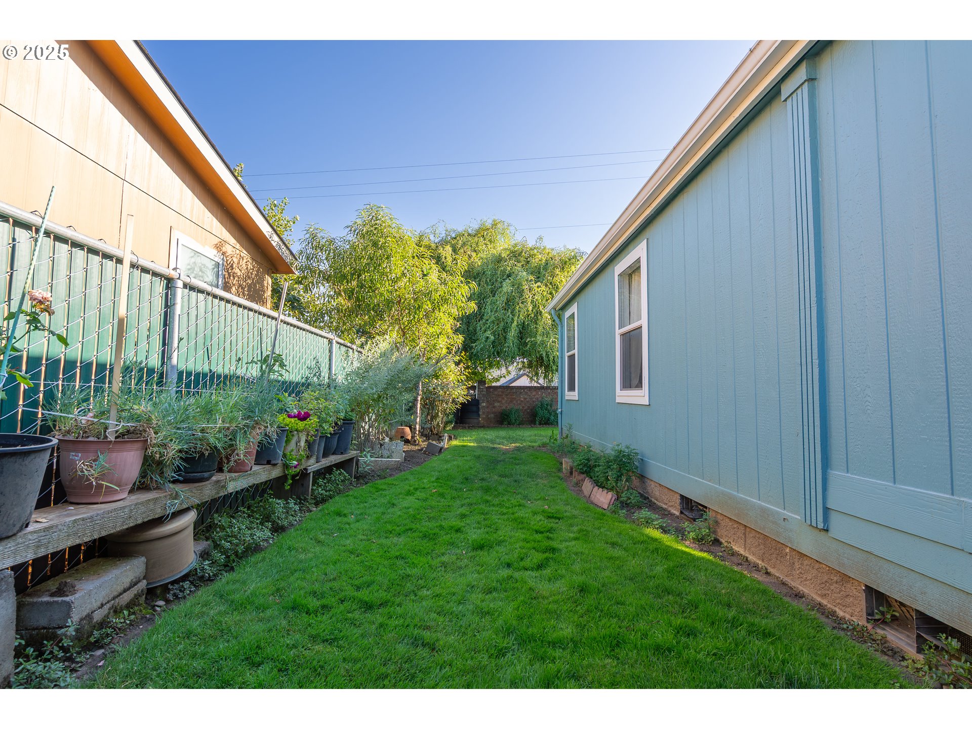 11105 Main Street Northeast, Unit 6 Donald, OR 97020 - Photo 21 of 23 a backyard of a house with seating space