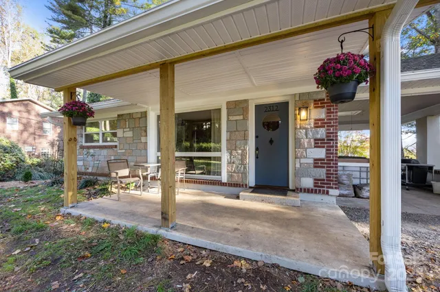 a view of a building with a porch