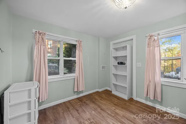 a view of a hardwood & utility room