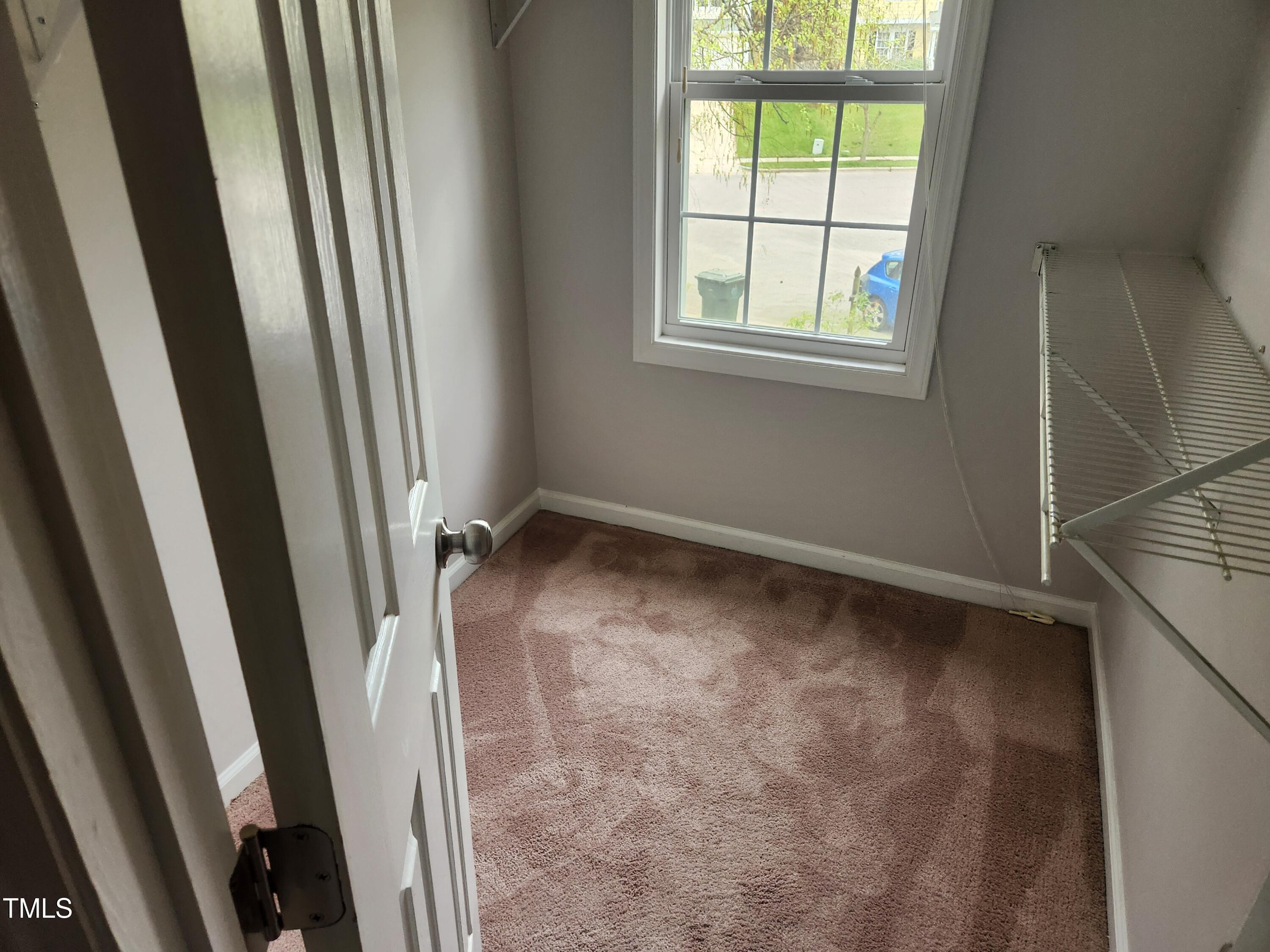 709 Thistlegate Trail Raleigh, NC 27610 - Photo 34 of 40 an empty room with windows