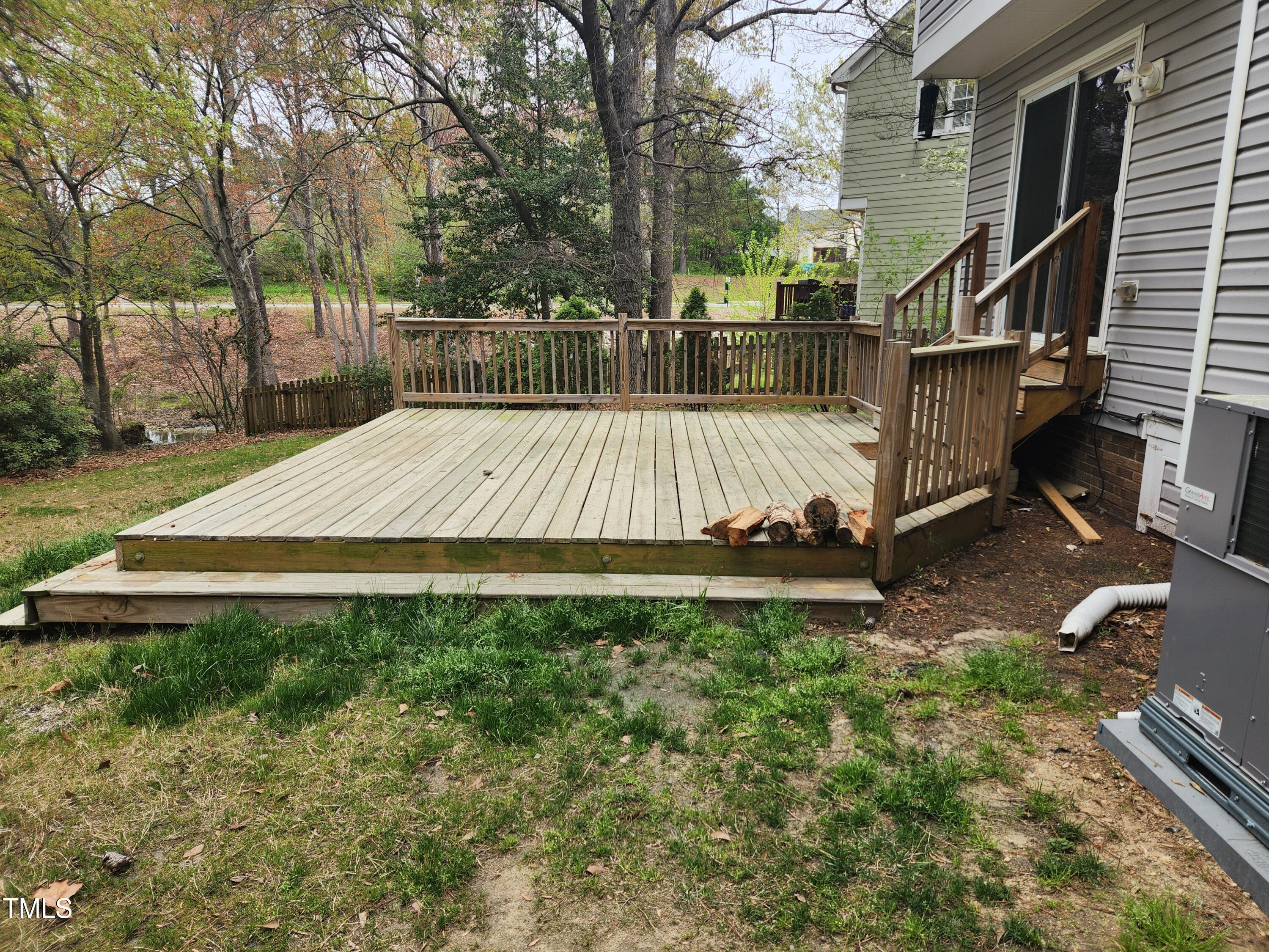 709 Thistlegate Trail Raleigh, NC 27610 - Photo 7 of 40 a view of backyard with wooden fence