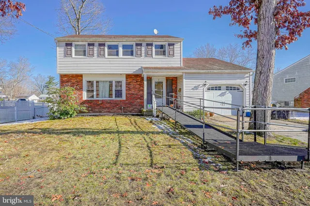 a front view of a house with swimming pool