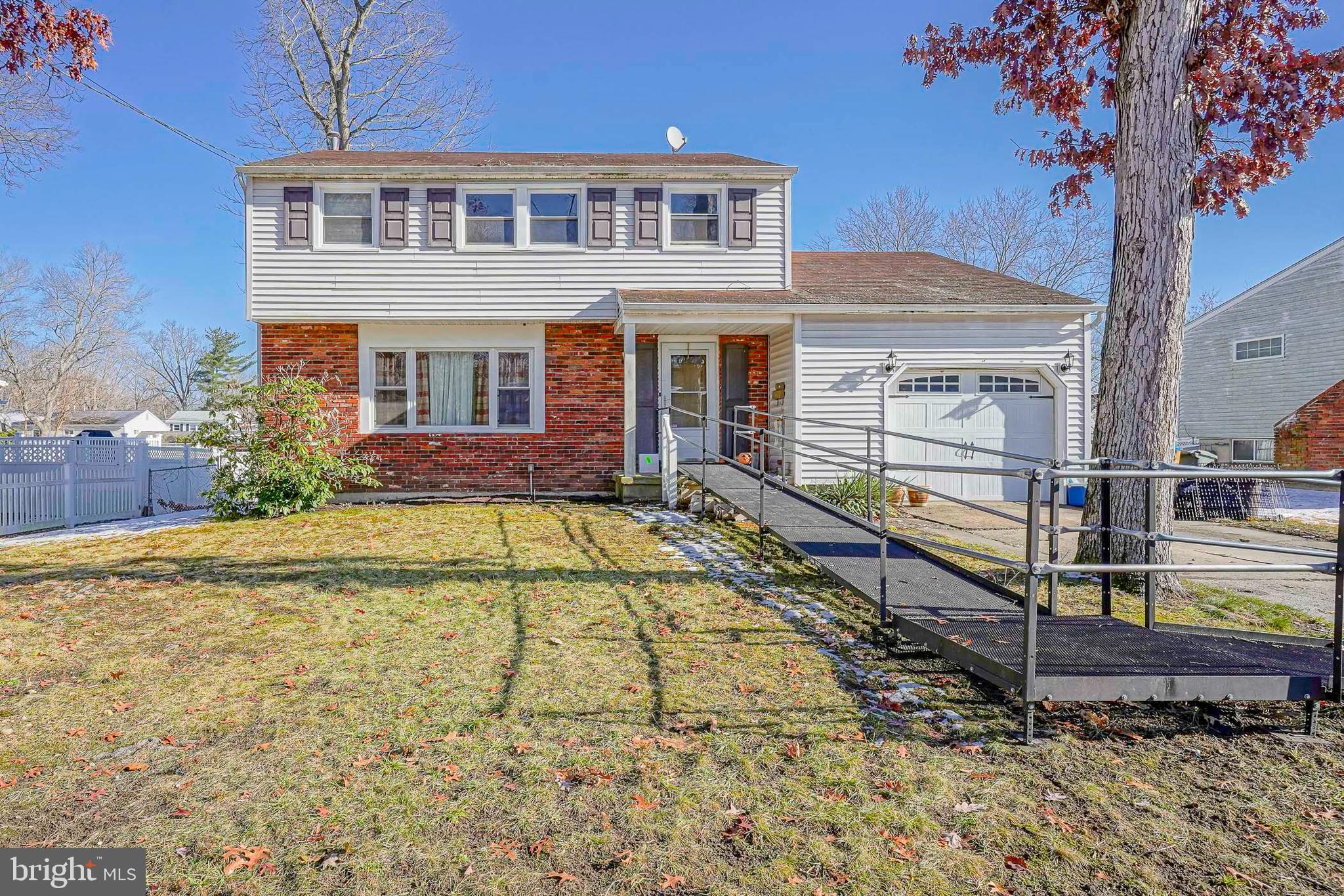 a front view of a house with swimming pool