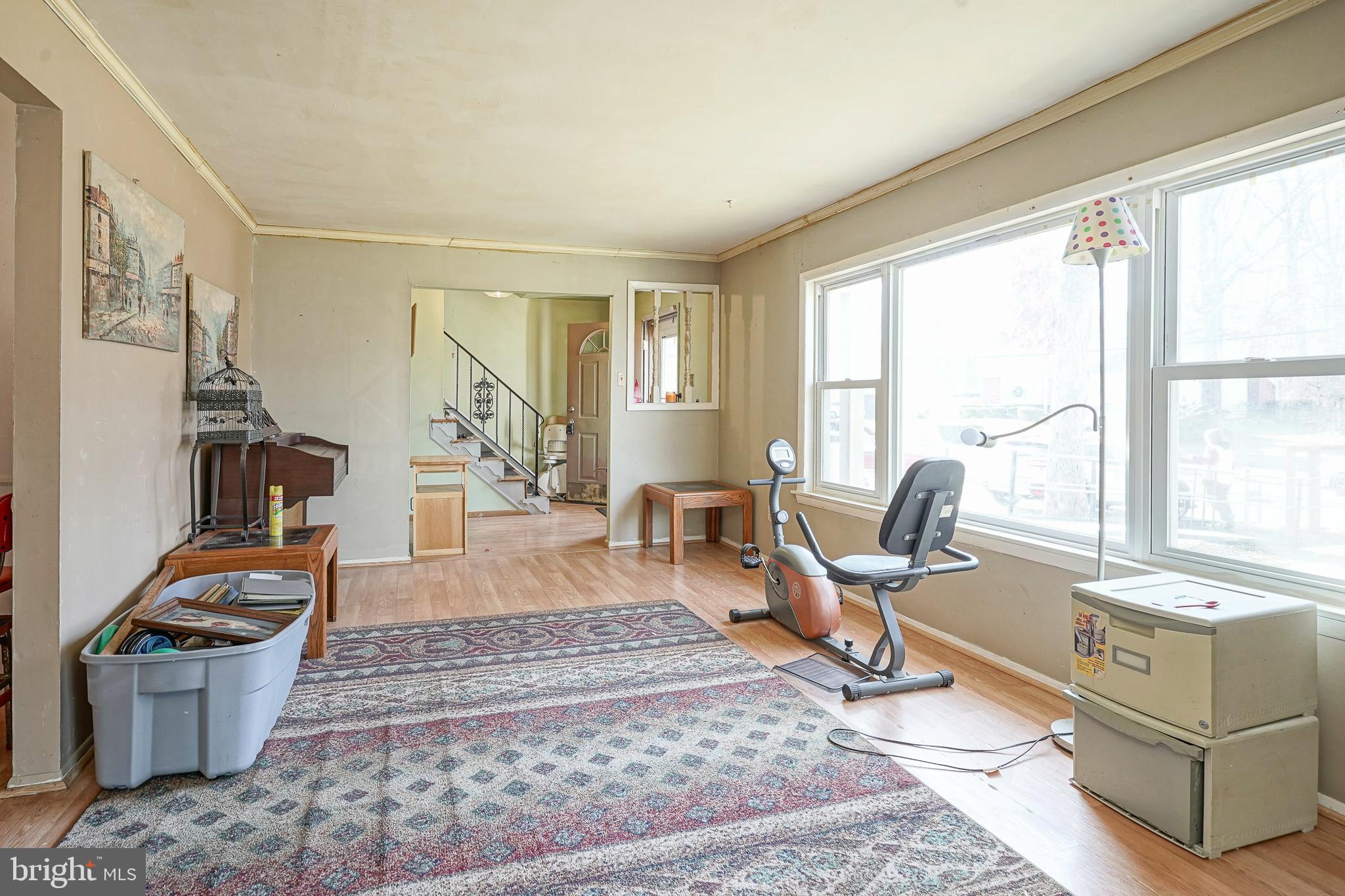 1638 Red Oak Road Williamstown, NJ 08094 - Photo 10 of 23 a living room with furniture a wooden floor and a large window