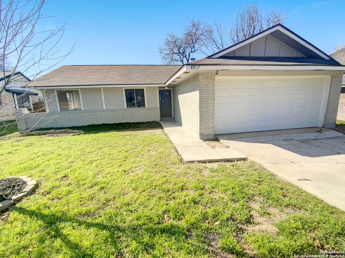 4917 Brookhead Lane Schertz, TX 78108 - Photo 1 of 1 a front view of a house with a yard