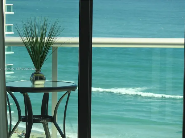 a view of a lake from a balcony