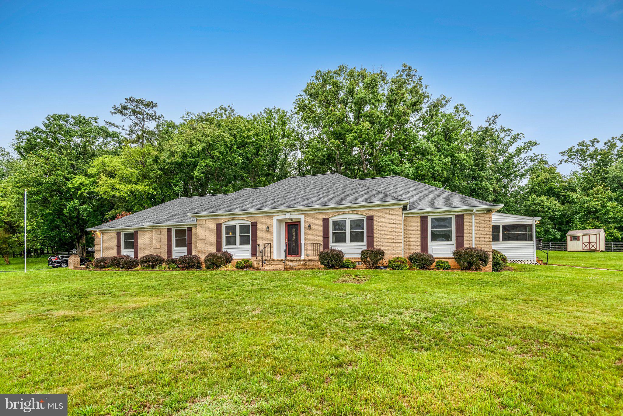 7961 Leeds Manor Road Marshall, VA 20115 - Photo 2 of 40 a view of a house with a yard