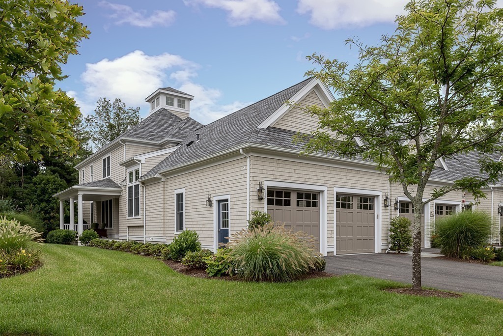 10 Backriver Road, Unit 10 Hingham, MA 02043 - Photo 1 of 30 a view of a yard in front of house