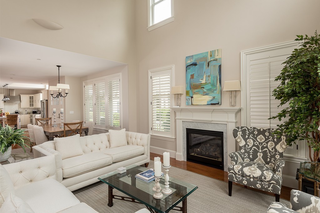 10 Backriver Road, Unit 10 Hingham, MA 02043 - Photo 13 of 30 a living room with furniture and a fireplace