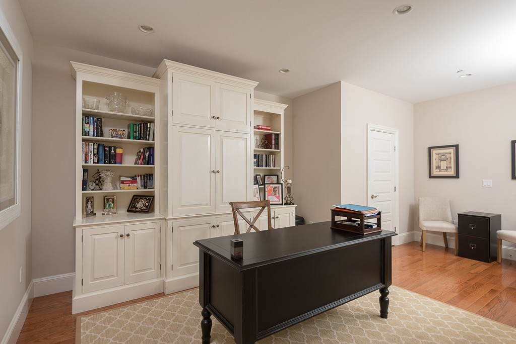 10 Backriver Road, Unit 10 Hingham, MA 02043 - Photo 19 of 30 a living room with furniture a rug and a window