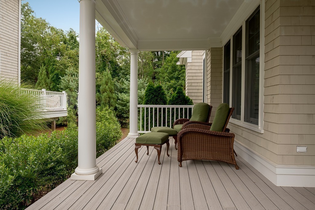 10 Backriver Road, Unit 10 Hingham, MA 02043 - Photo 2 of 30 a view of a two chairs in the balcony