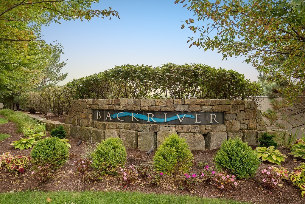 10 Backriver Road, Unit 10 Hingham, MA 02043 - Photo 30 of 30 a view of a street with a building in the background