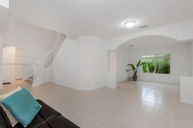 a view of livingroom with furniture and window