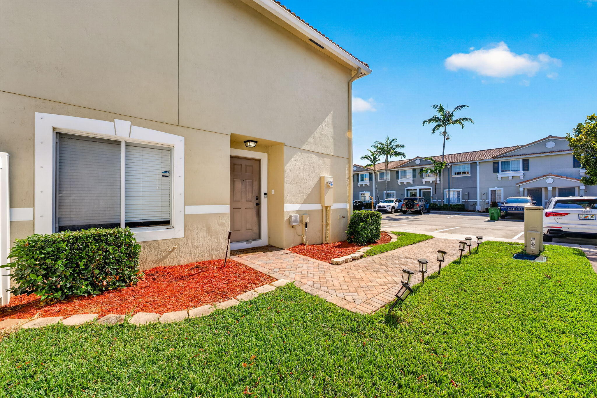 5951 Manchester Way Tamarac, FL 33321 - Photo 17 of 41 a view of a house with swimming pool and porch