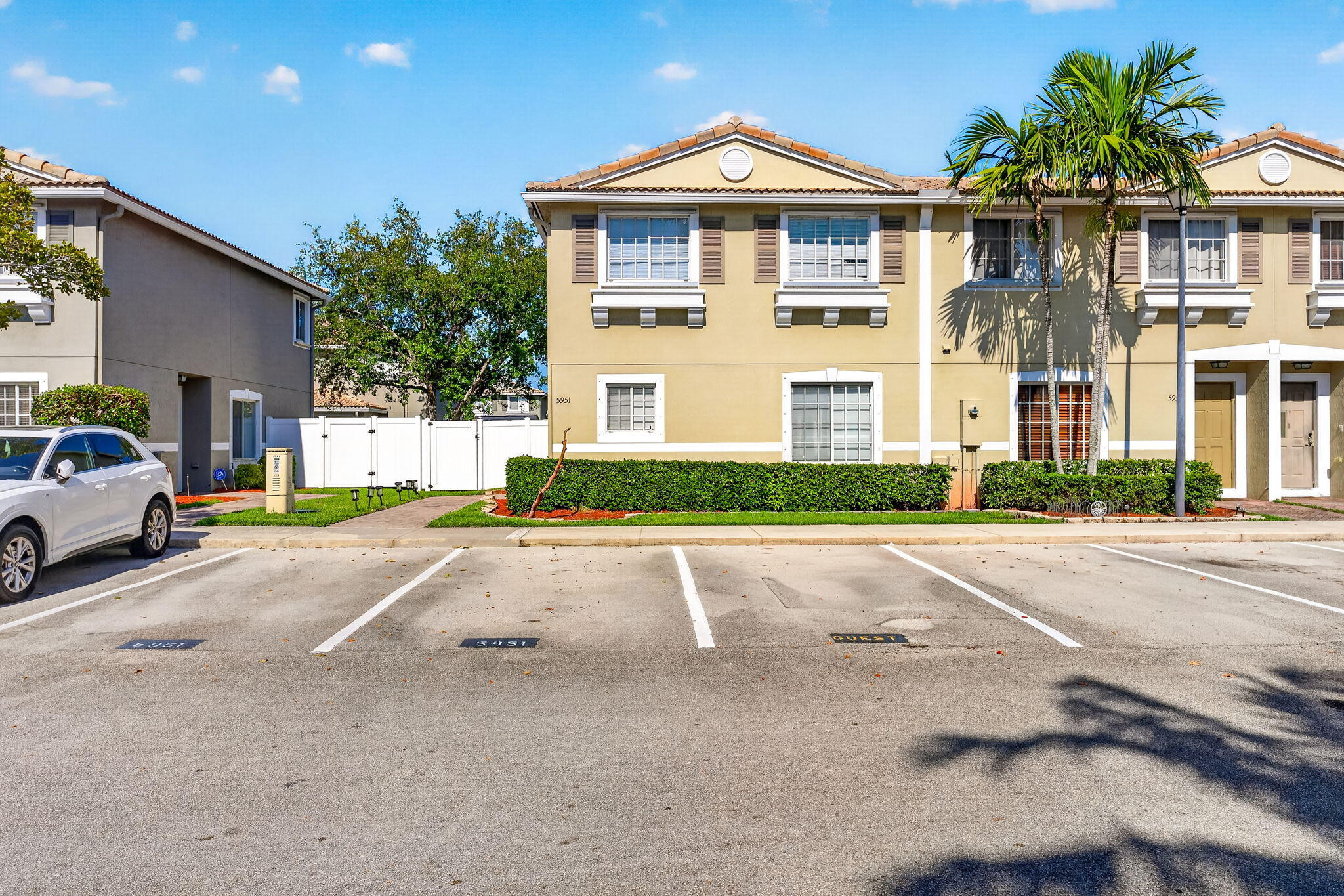 5951 Manchester Way Tamarac, FL 33321 - Photo 23 of 41 a front view of a house with a yard