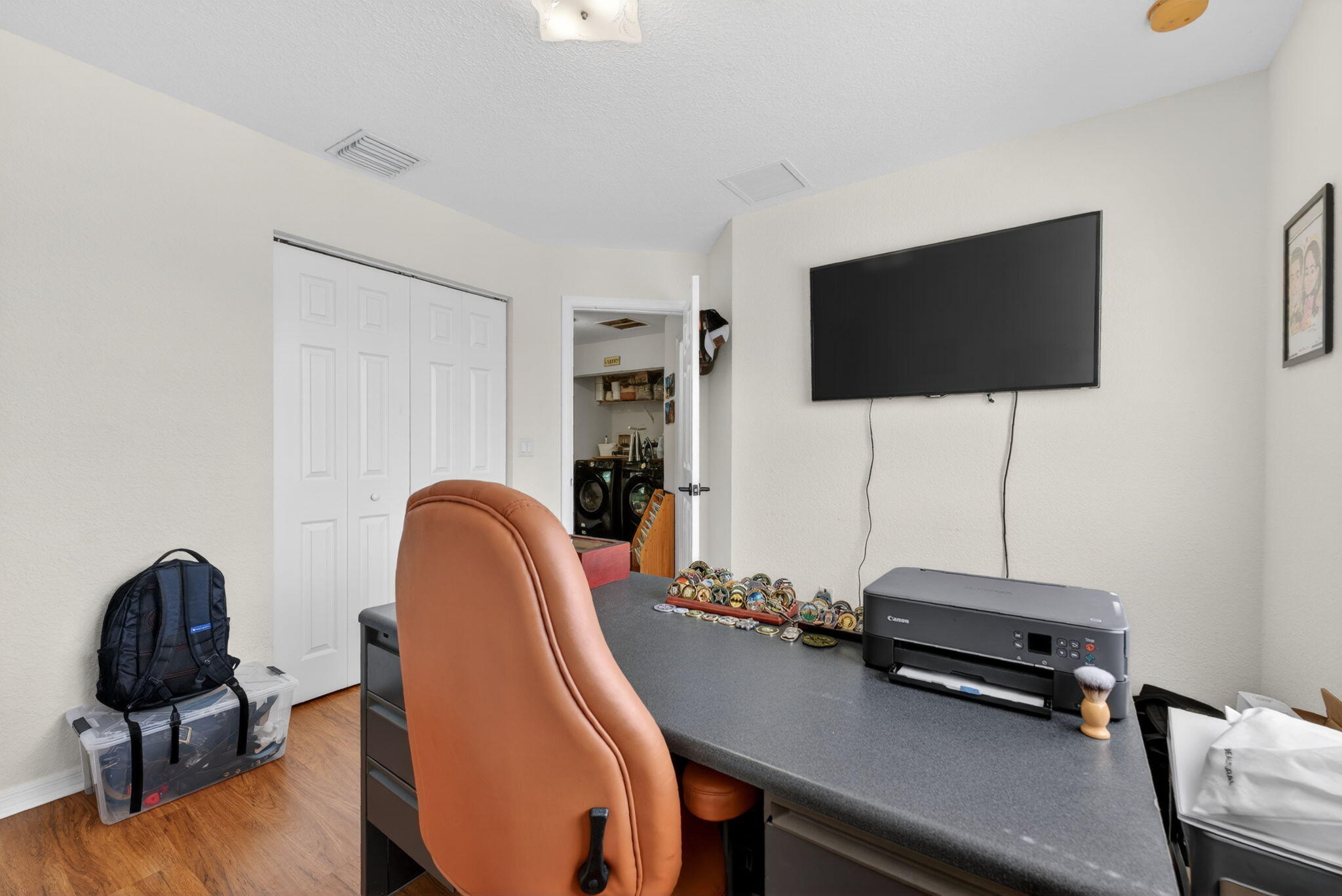 5951 Manchester Way Tamarac, FL 33321 - Photo 25 of 41 a living room with furniture and a flat screen tv