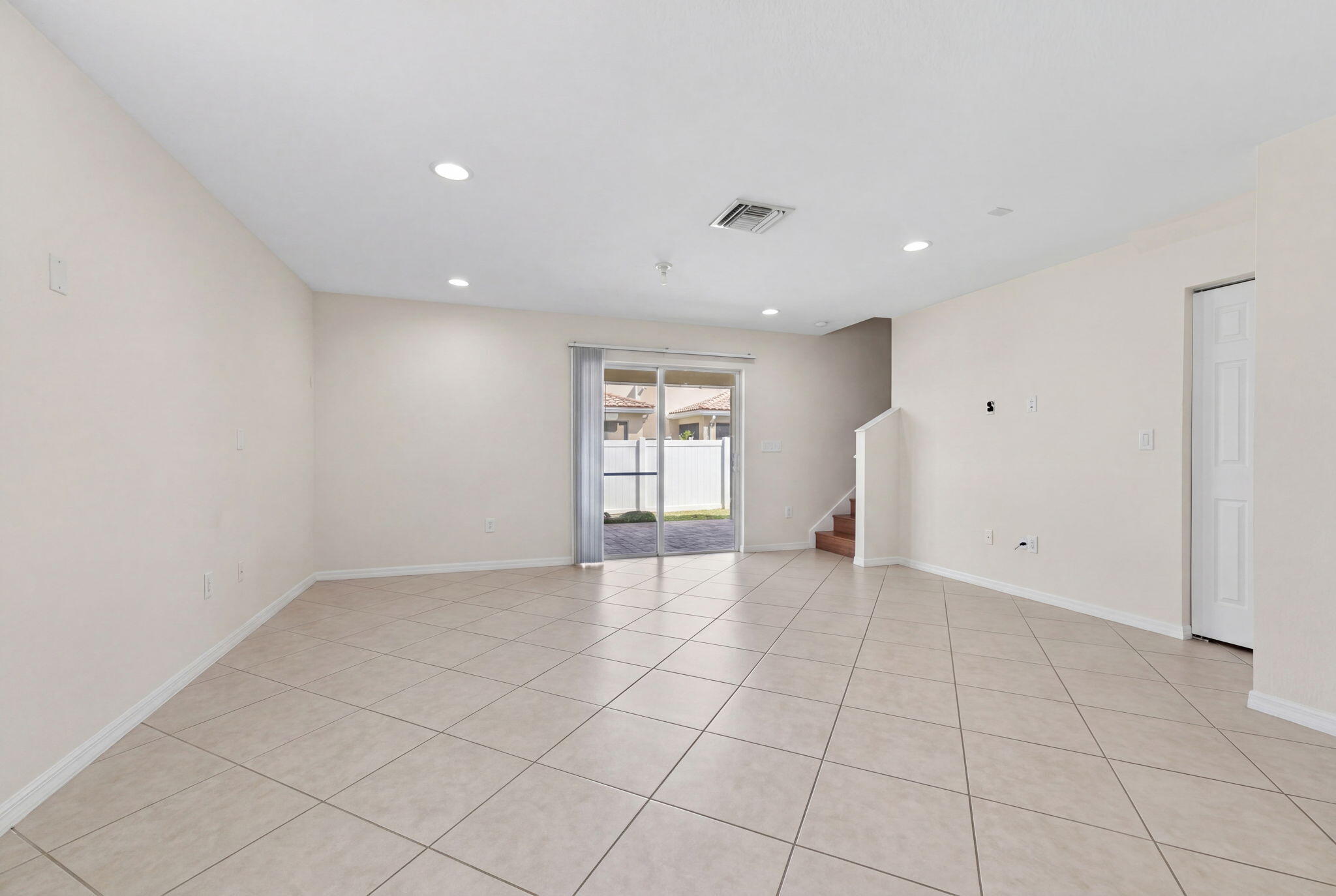 5951 Manchester Way Tamarac, FL 33321 - Photo 26 of 41 a view of an empty room with closet and a window