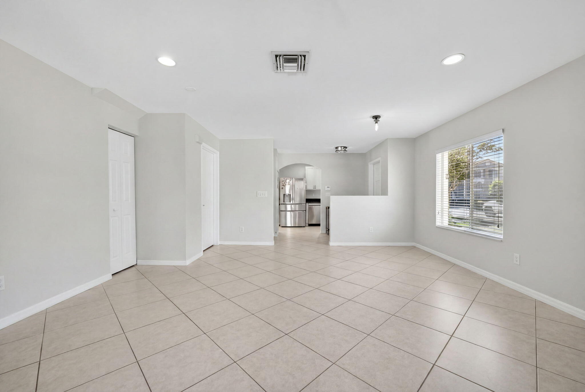 5951 Manchester Way Tamarac, FL 33321 - Photo 27 of 41 a view of empty room with windows