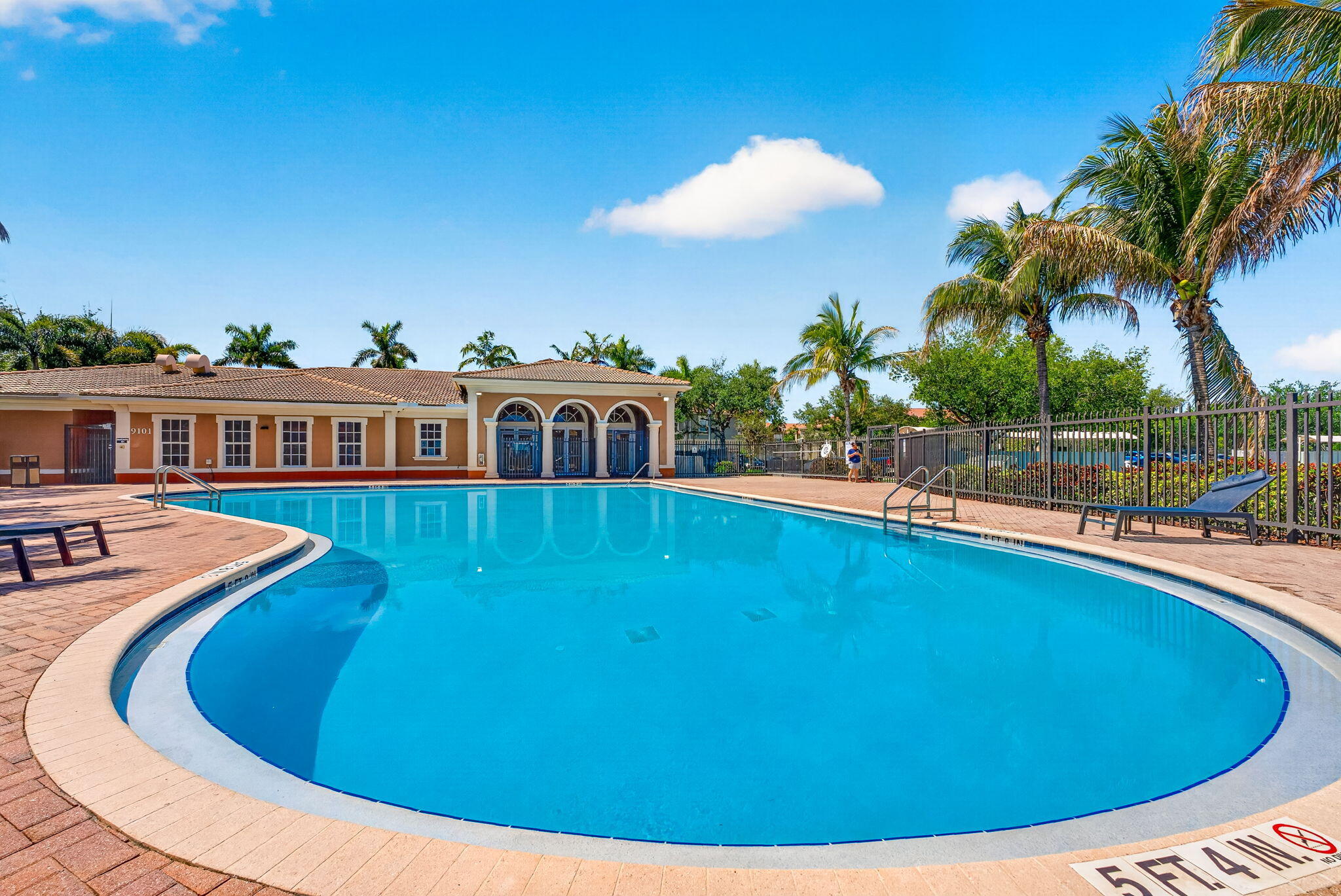 5951 Manchester Way Tamarac, FL 33321 - Photo 38 of 41 a view of a swimming pool with an outdoor seating