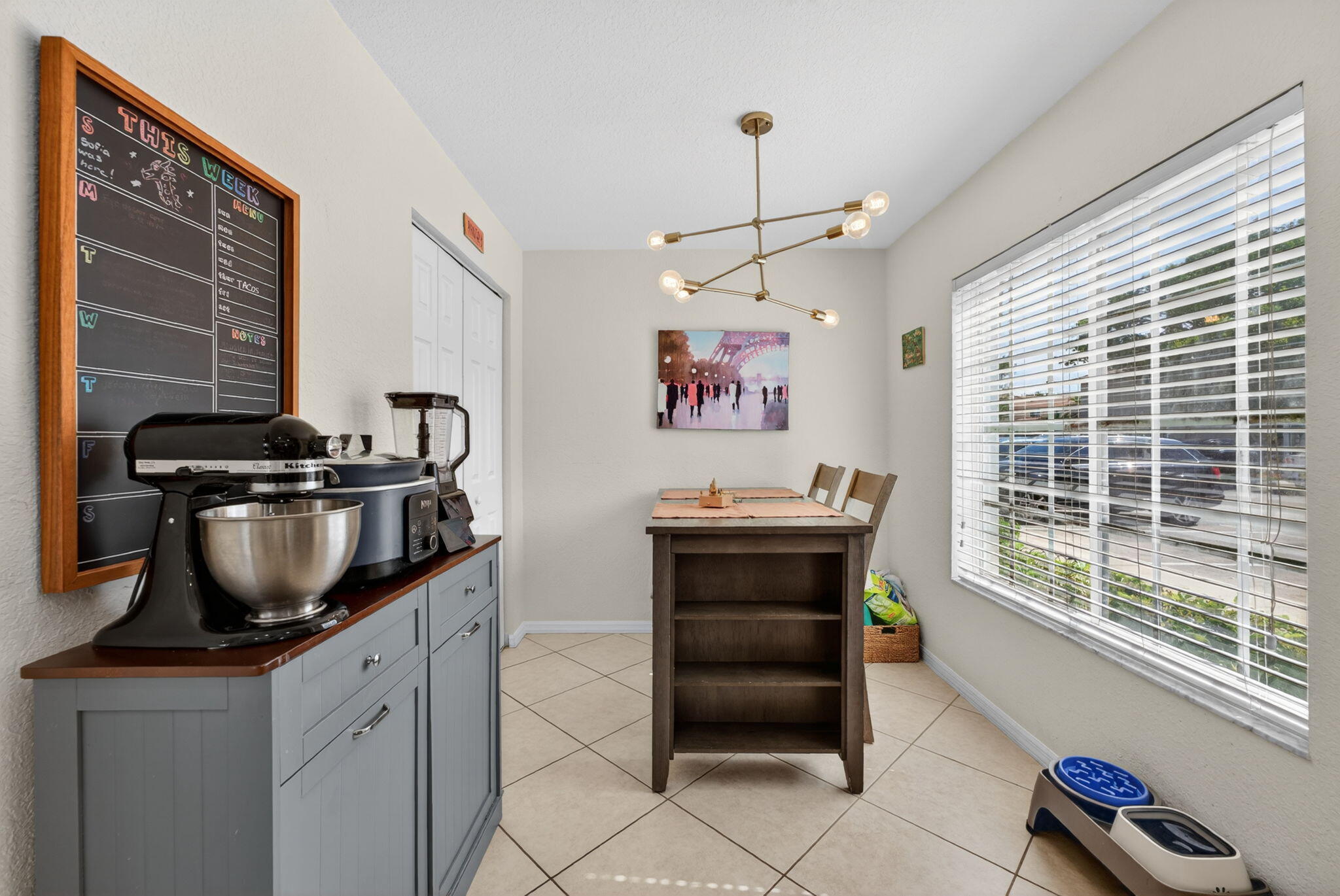 5951 Manchester Way Tamarac, FL 33321 - Photo 39 of 41 a kitchen that has a stove a sink and a microwave