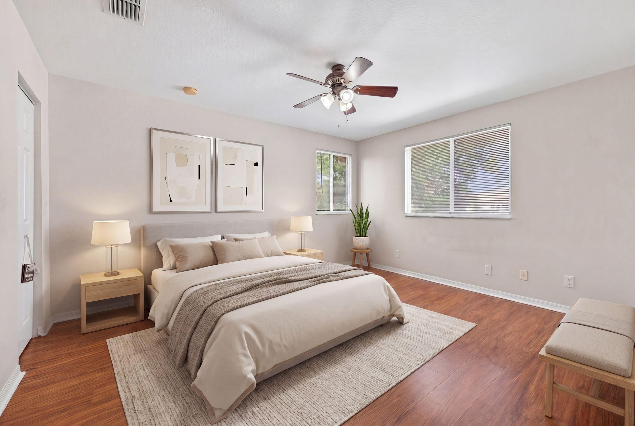 5951 Manchester Way Tamarac, FL 33321 - Photo 4 of 41 a bedroom with a large bed and a chandelier