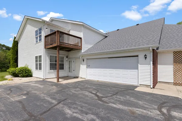 a view of a house with a garage