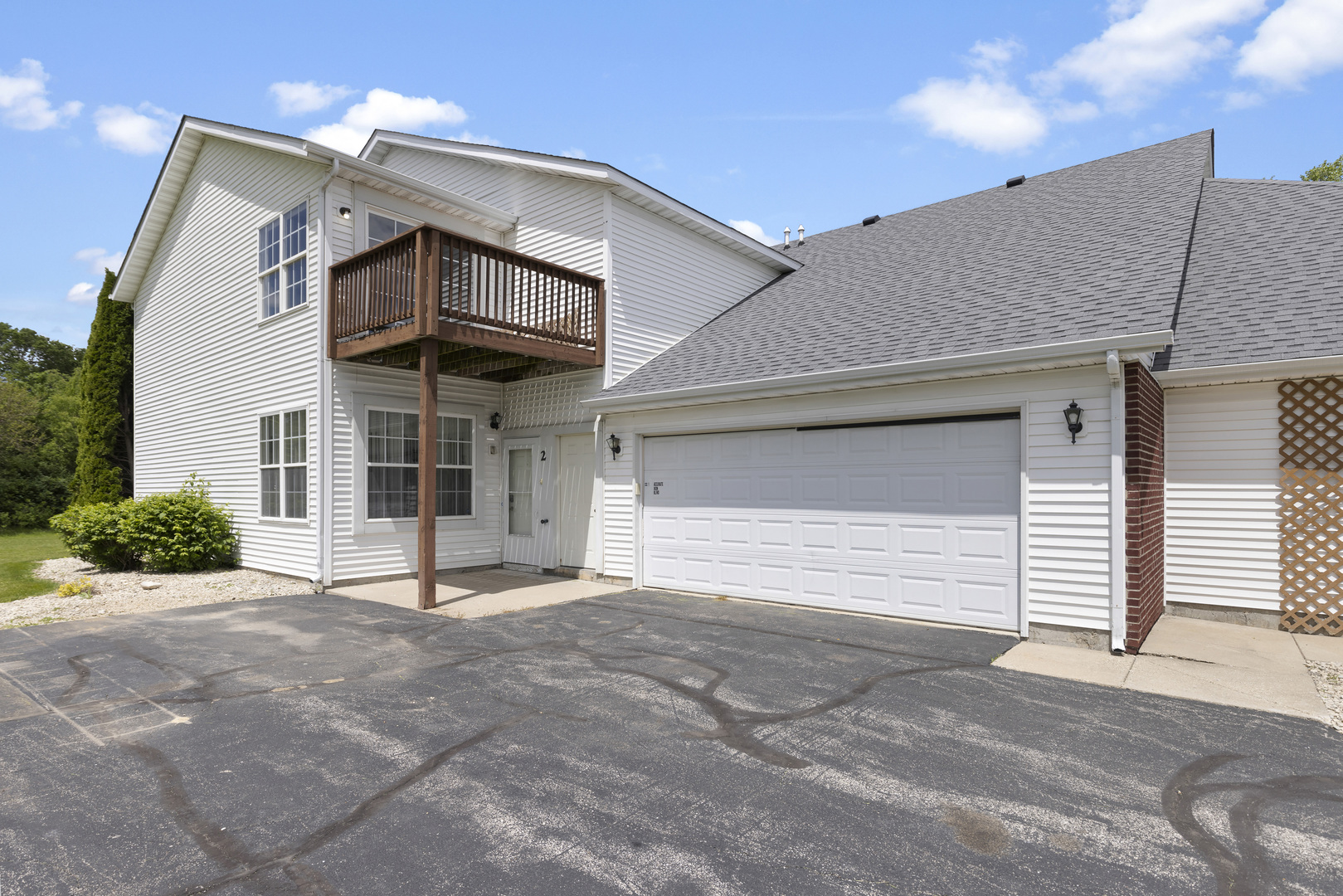 a view of a house with a garage