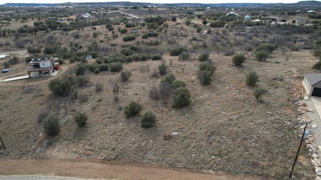 7092 Hells Gate Loop Strawn, TX 76475 - Photo 4 of 8 a view of a dry field